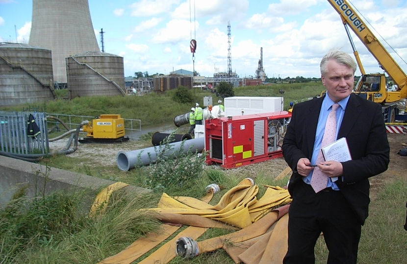 Graham standing at a pumping station in Burstwick