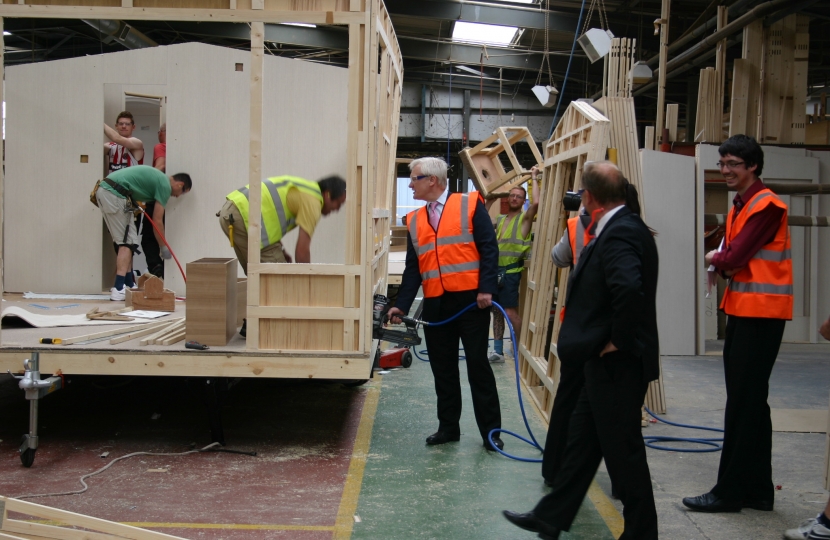 Graham walking the factory floor at ABI caravans.