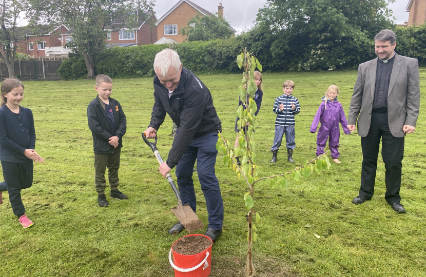 Graham planting tree at Cherry Burton Primary School