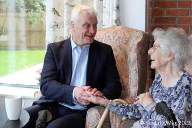 Graham speaking to a resident at Chapter House Care Home